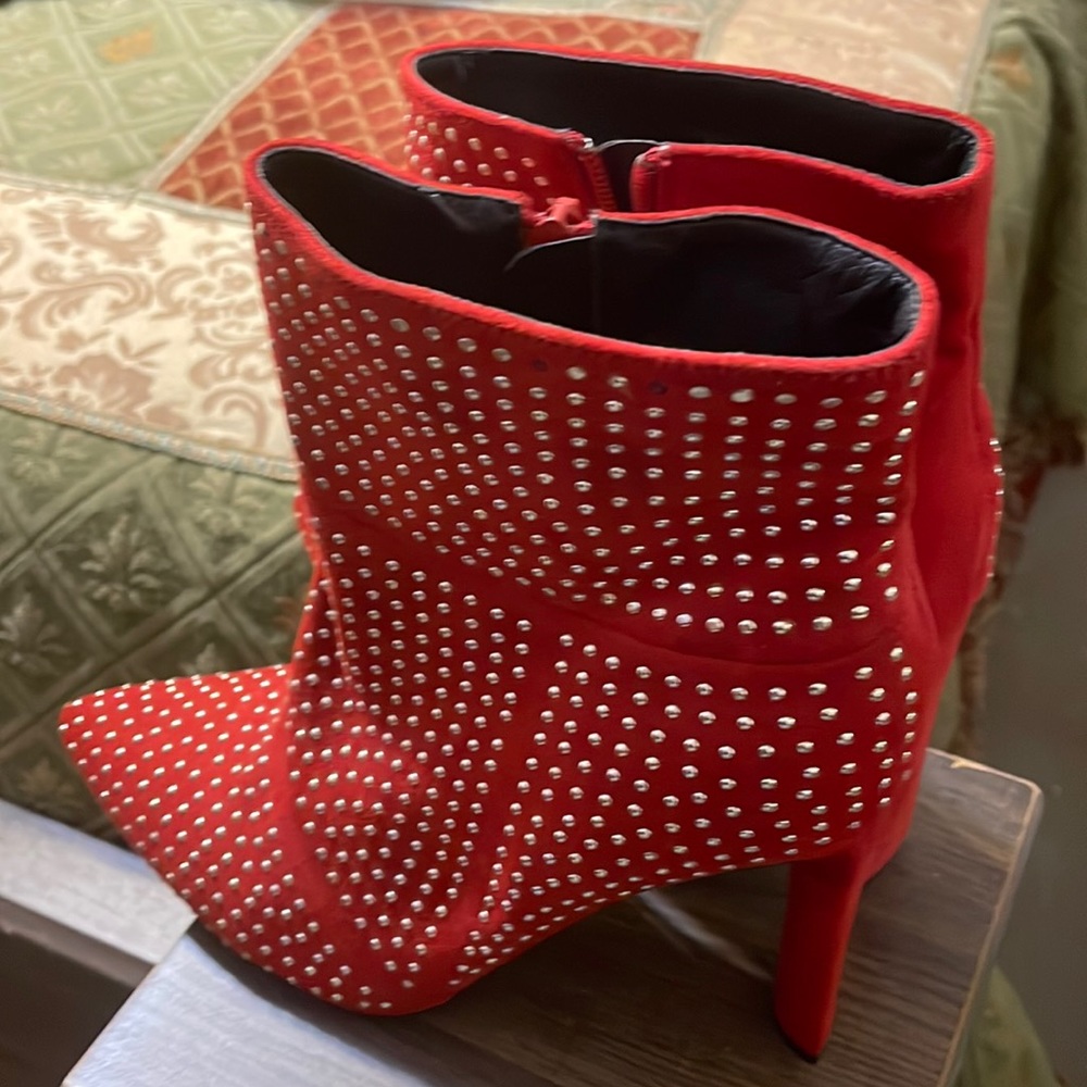 Red ankle boots with beaded design